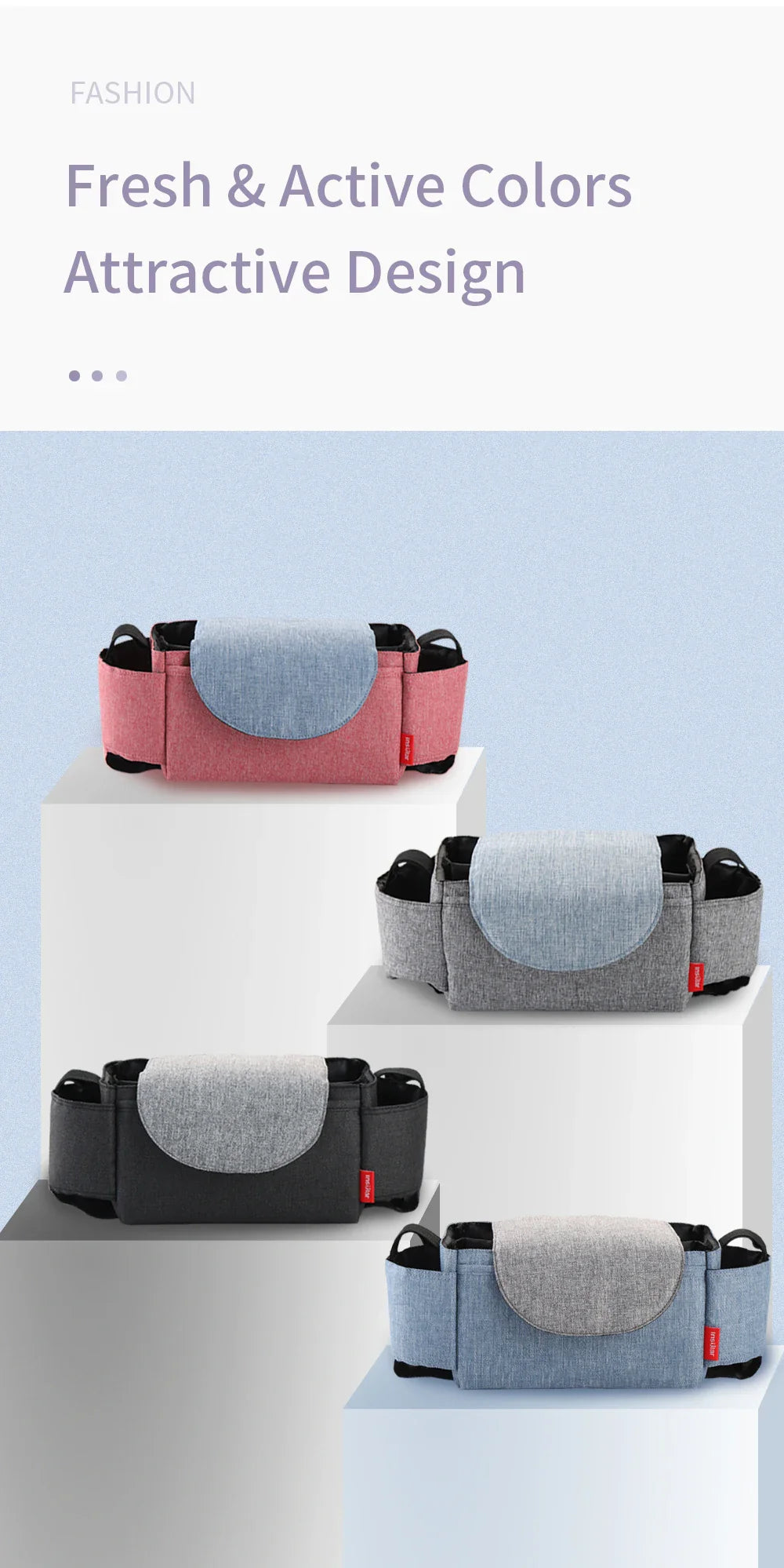 Front pocket of unisex insulated diaper bag holding pacifiers and small baby essentials.