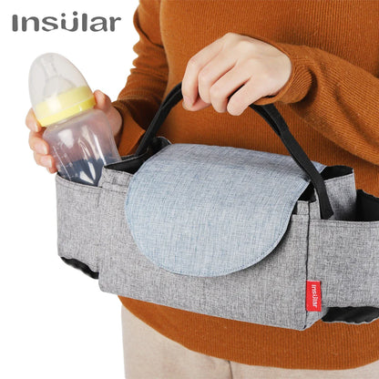 Unisex diaper bag, black polyester, open front revealing spacious interior for baby essentials, maternity.