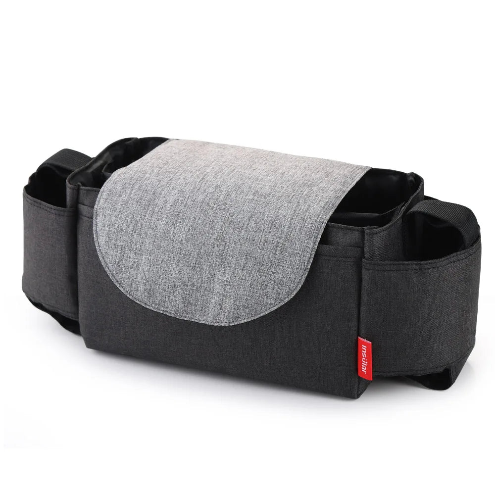 Unisex diaper bag, close-up of insulated milk bottle pocket with zipper, essential for baby travel.