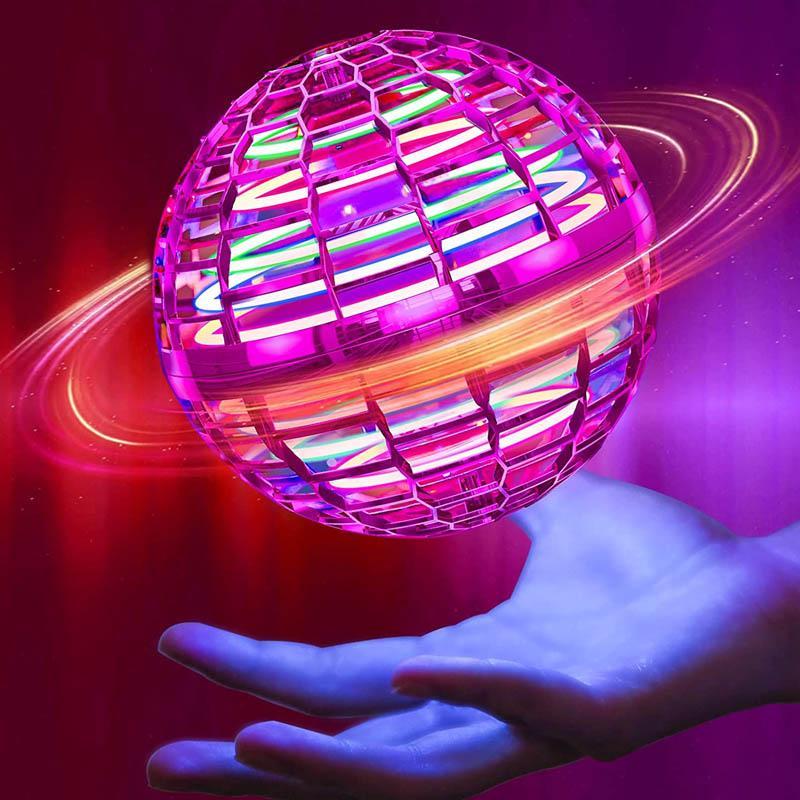 Detailed close-up of a durable flying orb minidrone toy, highlighting its protective cage and LED lights