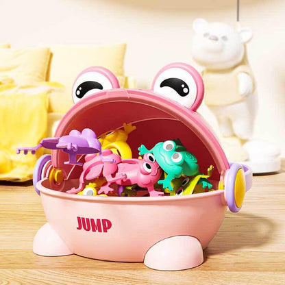 Child reaching for a colorful jumping frog toy, engaging educational game for family fun playtime