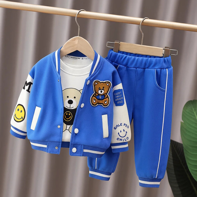 Toddler's 3-piece outfit: cute bear baseball jacket, simple white T-shirt, and black comfy pants.
