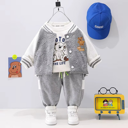 3-piece toddler outfit: stylish bear baseball jacket, simple white tee, and versatile black pants.