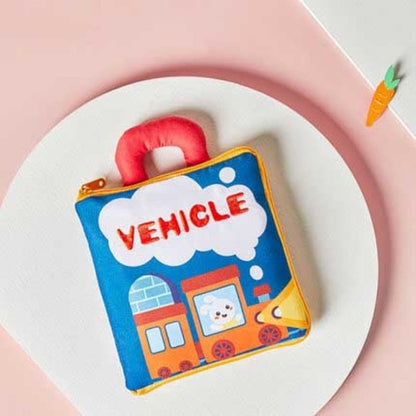 Child playing with a durable, washable cloth activity book, a safe and engaging educational resource