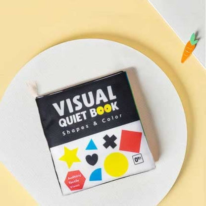 Detailed view of a childrens cloth book with different fastenings and textures, enhancing motor skills