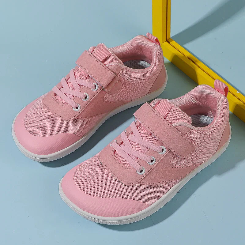 Barefoot flexible children footwear, an overhead view showing wide toe box comfort.