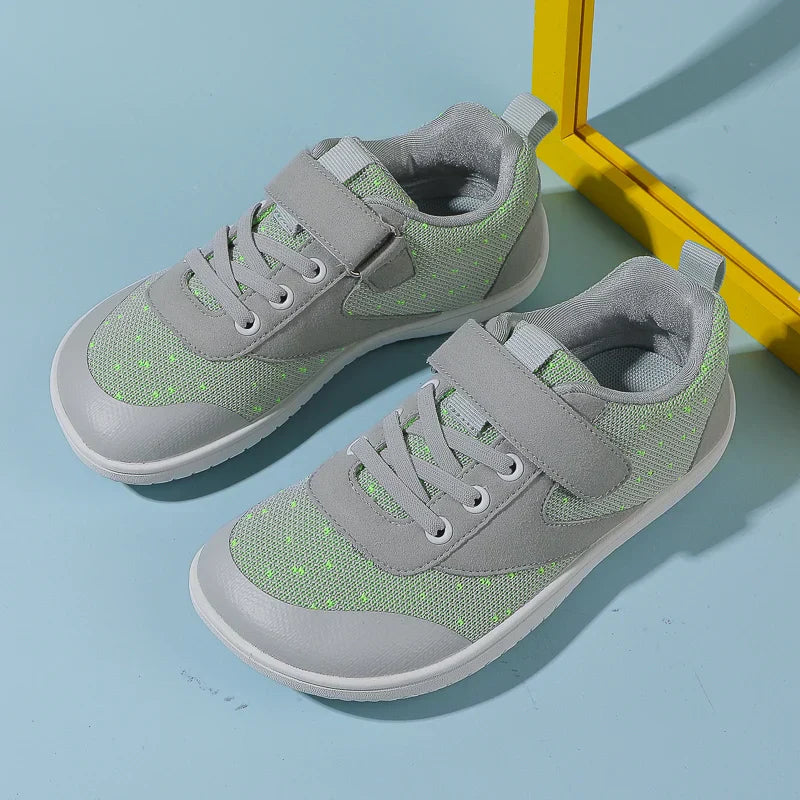 Unisex kids' barefoot active shoes in a multi-color design, perfect for school or play.