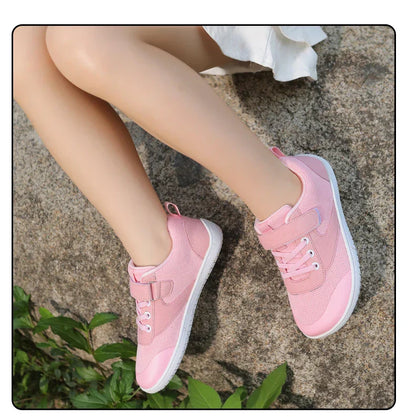 Kids' barefoot sneakers in a bright yellow, providing lightweight comfort for growing feet.
