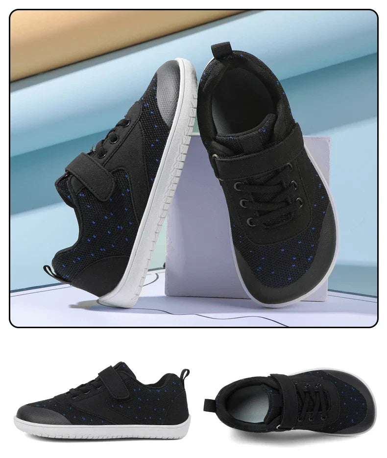 Lightweight barefoot children's sneakers in vibrant red, promoting natural foot movement.