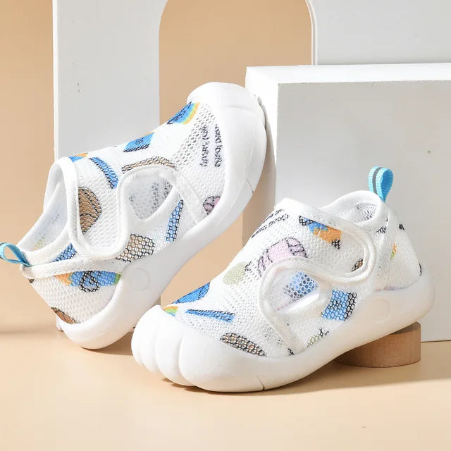 Breathable mesh first walker sandals for unisex baby, offering comfort and support.