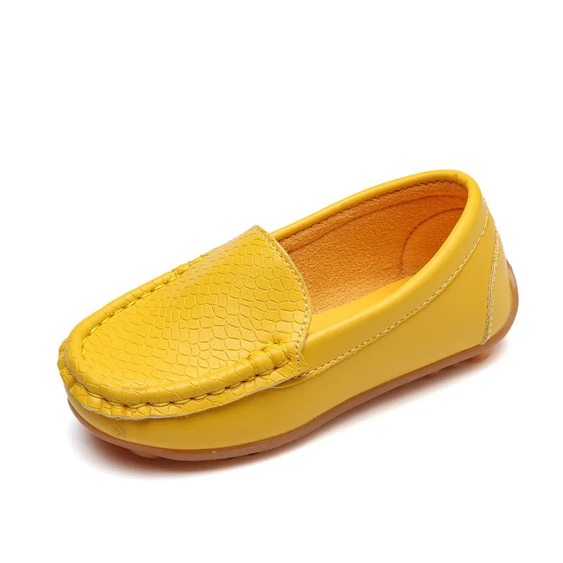 Unisex toddler slip-on loafers in a bright color, made with breathable material. Cute kids shoes.