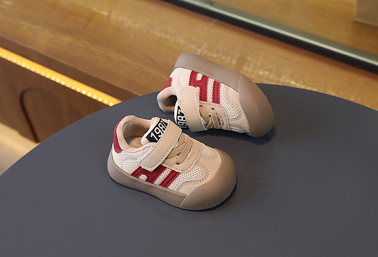 Kids' active play sneakers, breathable upper, non-slip rubber sole, patchwork style detailing.