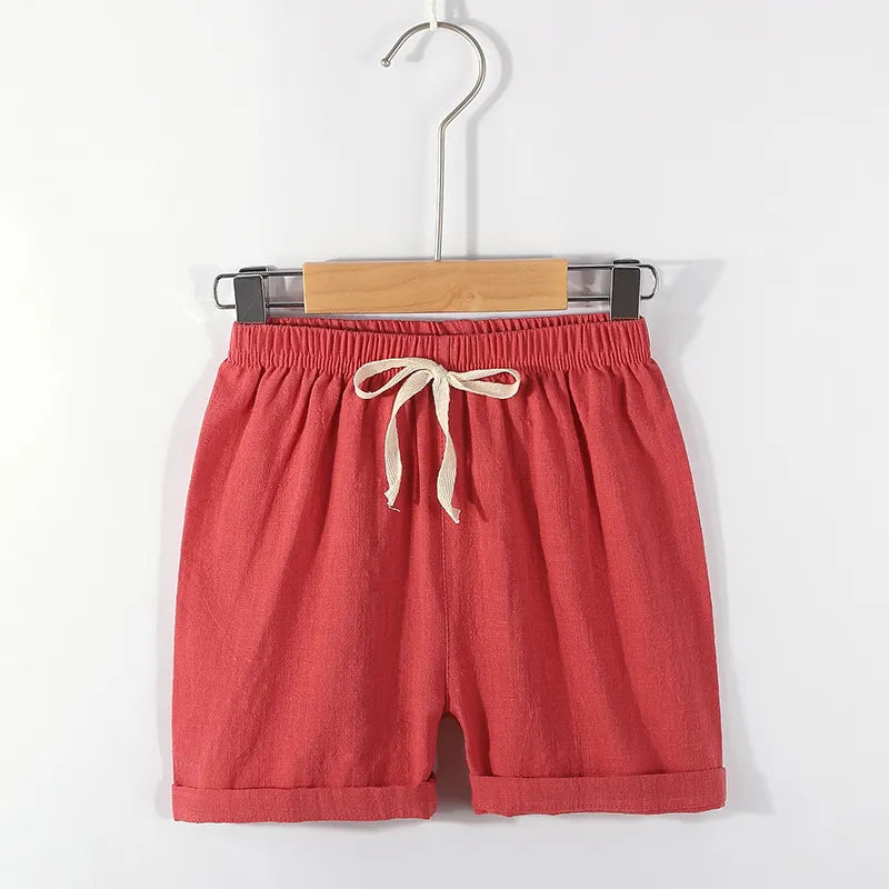 Unisex kids candy green cotton linen summer shorts with comfortable high elastic waist