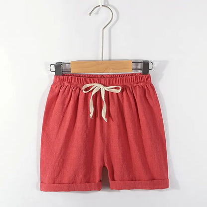 Unisex kids candy green cotton linen summer shorts with comfortable high elastic waist