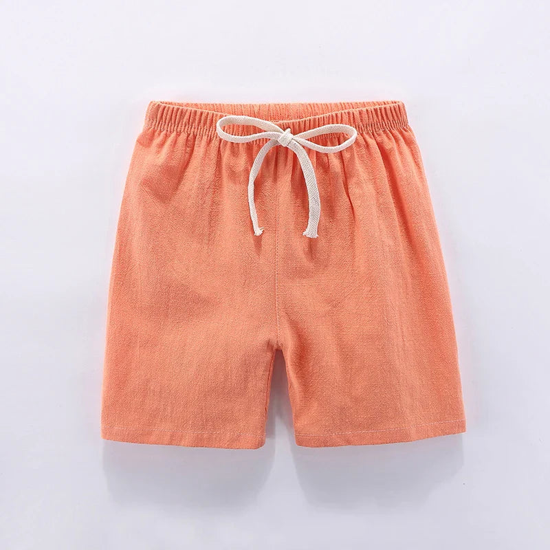 Close-up of fabric: textured cotton linen, candy color unisex kids high-waisted shorts