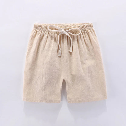 Unisex kids candy orange high-waisted shorts on hanger, ready for summer fun