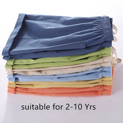 Unisex kids vibrant orange candy color cotton linen shorts, elastic waist, high-rise