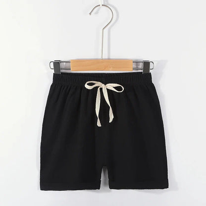 Cute unisex kids beige high-waisted summer shorts, soft cotton linen, elastic comfort