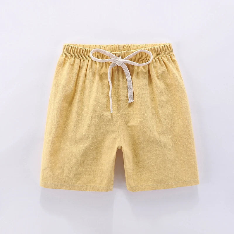 Unisex kids candy color pastel pink summer shorts, high-waisted design, cotton blend