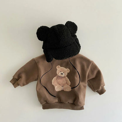 Soft unisex kids' sweatshirt, featuring a vibrant cartoon print, ideal for autumn