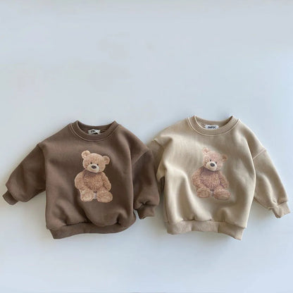 Unisex kids' autumn wear: a warm cotton hoodie with fun cartoon graphics