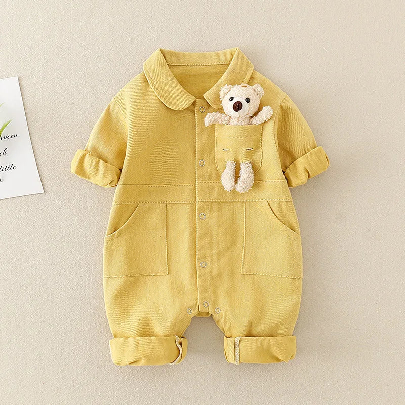 Denim jumpsuit for kids, flat lay against a white background, highlighting front pockets and quality stitching.