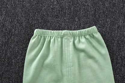 Unisex cotton pajama set for children, full length shot of top and pants, comfortable fit