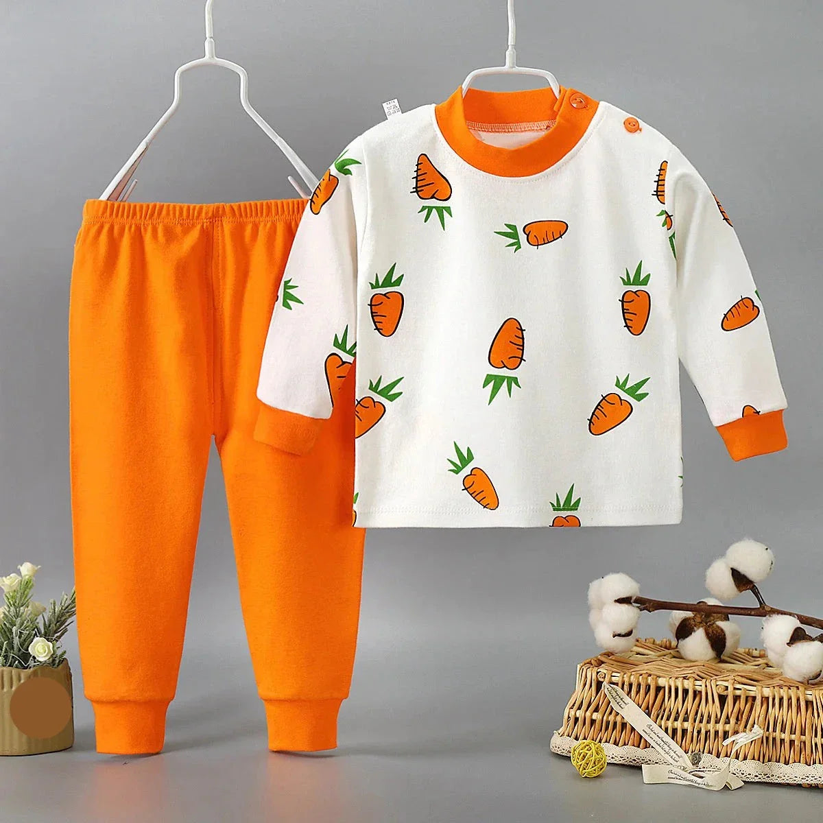 Close-up of soft cotton cartoon pajama top for toddlers, vibrant colors, unisex design