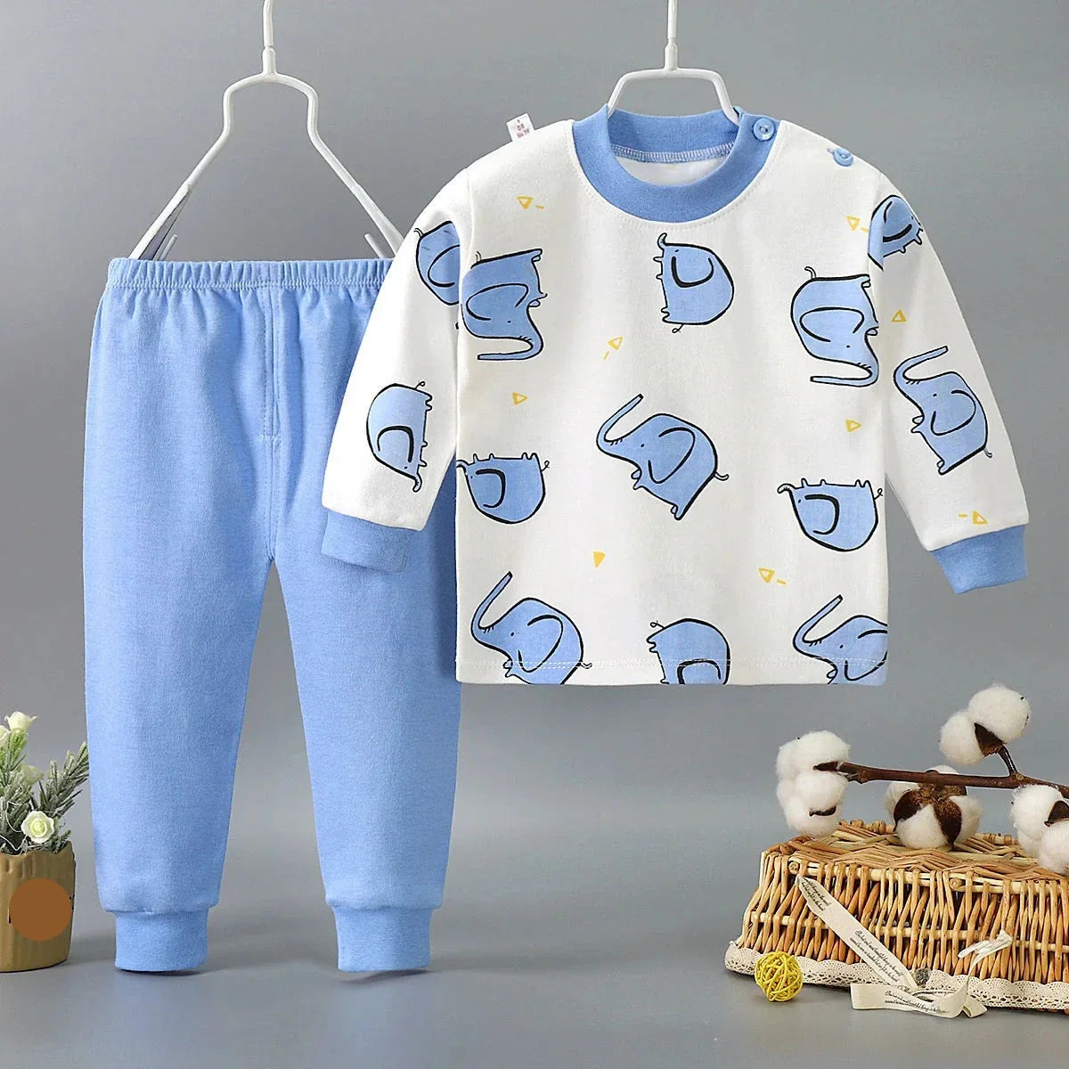 Toddler wearing an adorable long sleeve cartoon pajama set, perfect for spring sleepwear