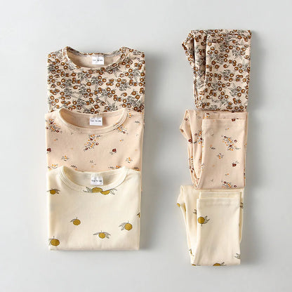 Unisex kids' cotton long-sleeve pajama set with blue and white stripes, perfect for spring/autumn sleepwear.