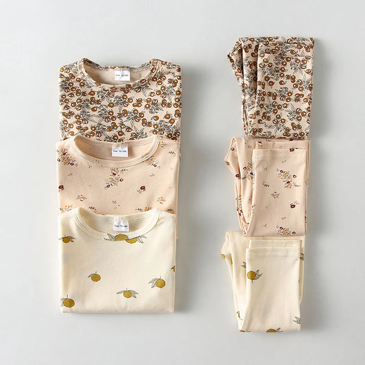 Unisex kids' cotton long-sleeve pajama set with blue and white stripes, perfect for spring/autumn sleepwear.