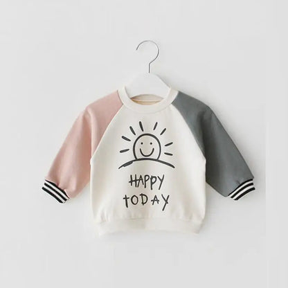Kids' cotton long sleeve tee, 'Happy Camper' lettering print, soft and breathable for children's comfort.