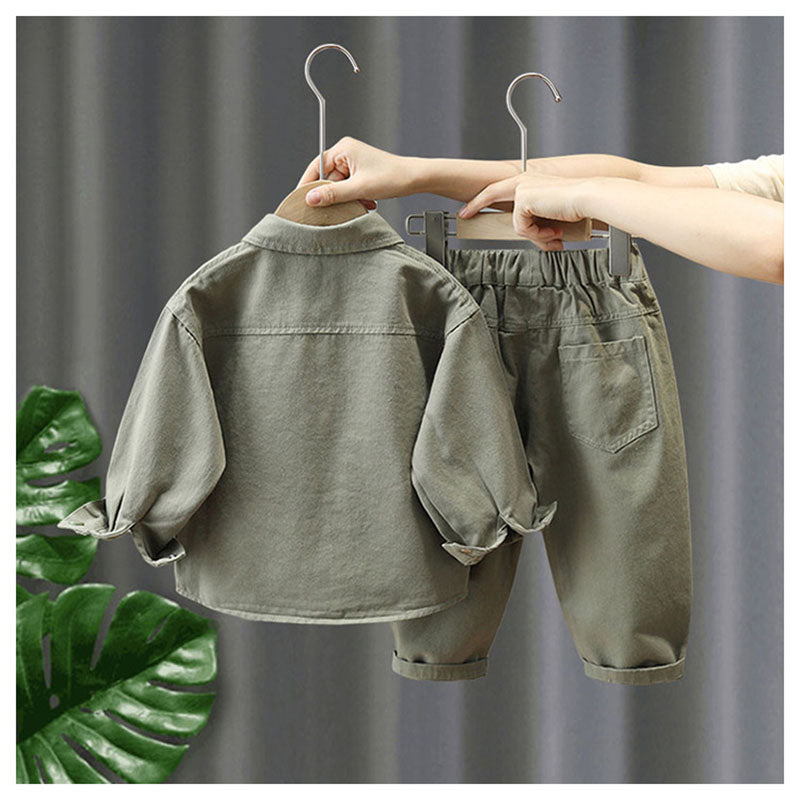 Kids' comfortable cotton loungewear set with a crew-neck top and elasticated pants in a neutral tone.