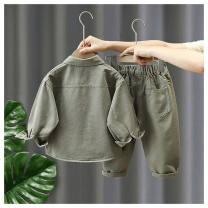 Kids' comfortable cotton loungewear set with a crew-neck top and elasticated pants in a neutral tone.