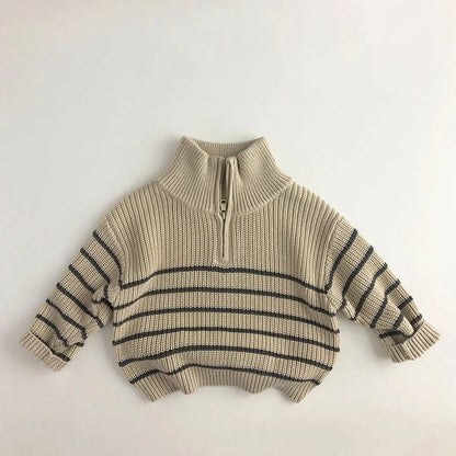 Close-up of soft cotton children's zipper sweater, ideal for comfortable toddler fashion