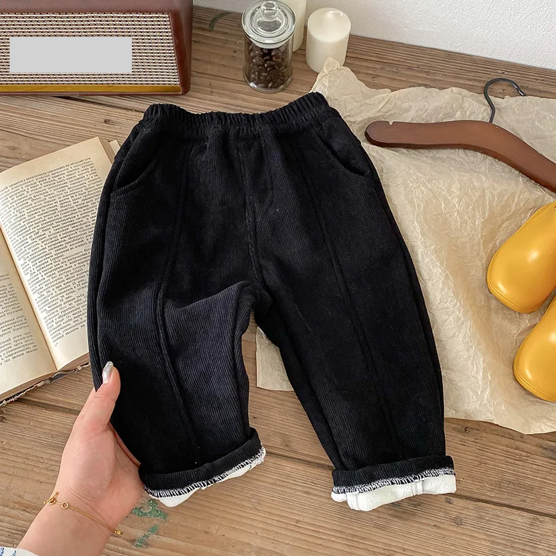 Elastic waistband and drawstring detail on unisex kids warm corduroy winter pants
