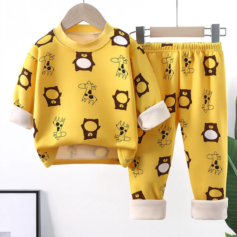 Warm and soft kids cartoon fleece thermal pajama set, perfect for snuggling in winter