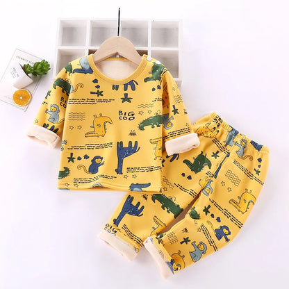 Kids winter pajamas: a unisex thermal fleece set featuring fun cartoon characters for comfort