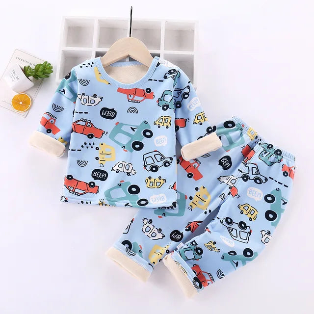Warm kids clothing: fleece thermal pajamas with a playful cartoon print for ultimate comfort