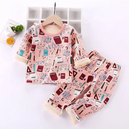 Comfortable toddler wear: a unisex cartoon fleece thermal pajama set for warmth and style
