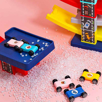 Kids playing with a gliding racing car track toy, showing engaging activity
