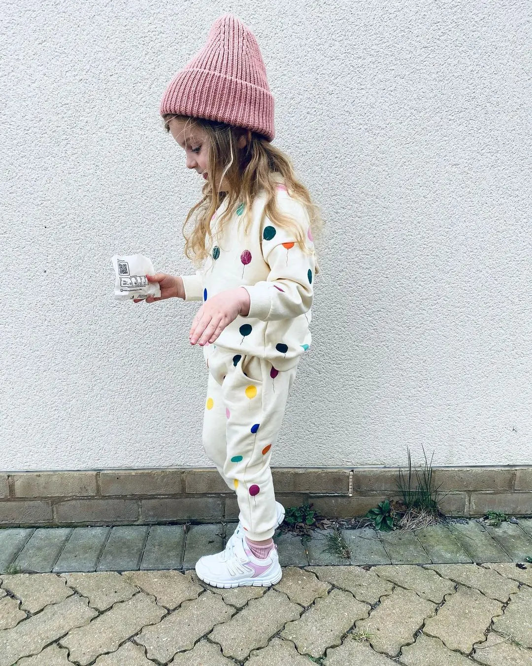 Unisex toddlers in a cozy cotton hooded sweater and pants set, front view