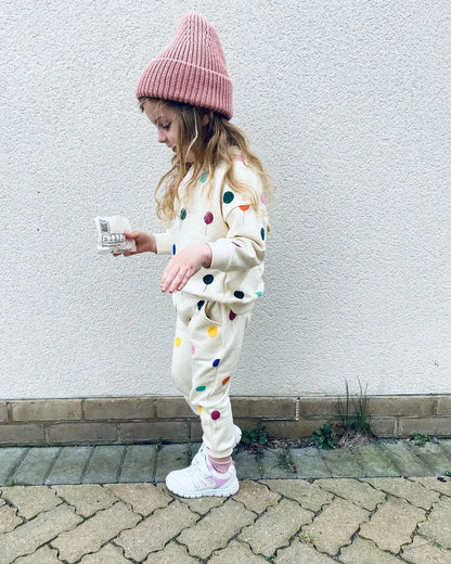 Unisex toddlers in a cozy cotton hooded sweater and pants set, front view