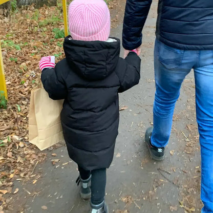Unisex kids' long padded winter jacket, hooded, with reinforced elbows for durability.