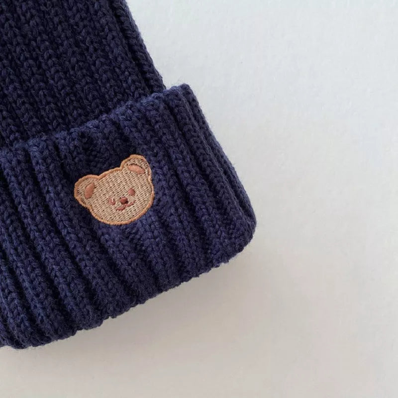 Unisex bear embroidery knitted beanie hat for children, an cozy and cute addition to their winter wardrobe.