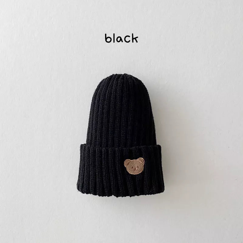 Soft touch knitted beanie hat for kids, embellished with a popular bear embroidery, great for everyday.