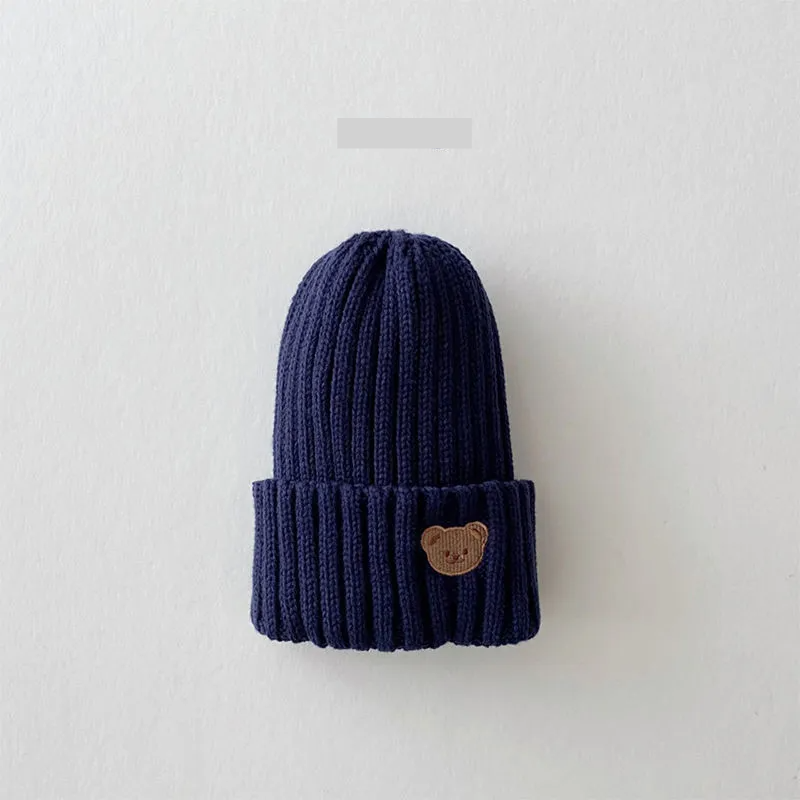 Versatile knitted beanie hat for toddlers, featuring a sweet bear embroidery, unisex and comfortable.