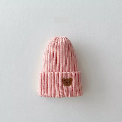 Soft cotton knitted beanie hat for kids, featuring a charming bear embroidery, a must-have winter accessory.