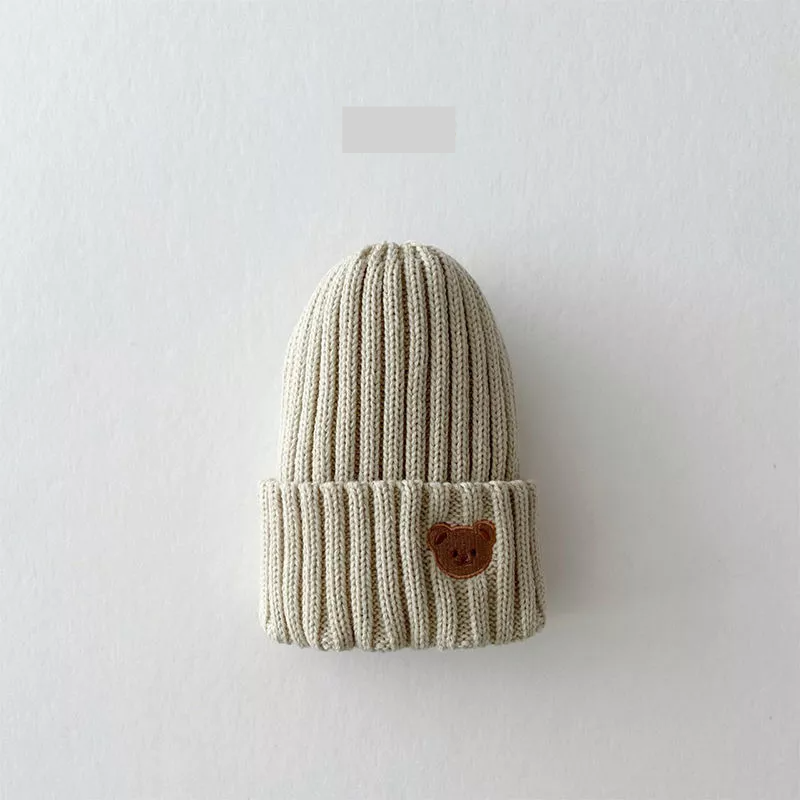Unisex toddler hat, knitted warm beanie with detailed bear embroidery, suitable for cold weather.