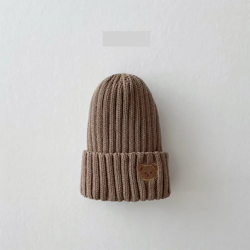 Cute bear embroidery knitted beanie hat for unisex babies, excellent for warmth and style during winter.